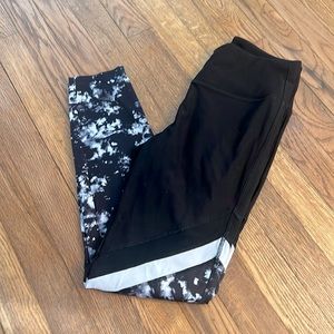 Black leggings with mesh and tie dye pattern